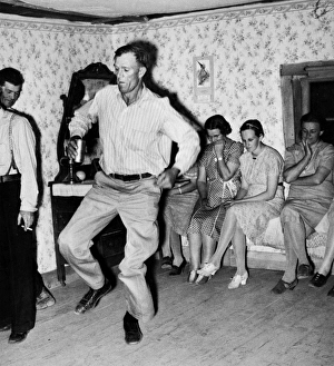 SQUARE DANCE, 1940. Square dancing at home in Pie Town, New Mexico. Photograph SQUARE DANCE, 1940. Square dancing at home in Pie Town, New Mexico. Photograph
