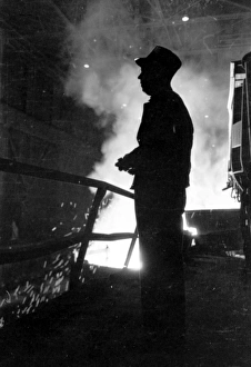 STEEL WORKER, 1949. Steel worker with smelter in Chicago, Illinois steel mill STEEL WORKER, 1949. Steel worker with smelter in Chicago, Illinois steel mill