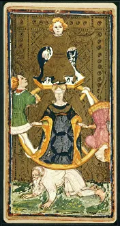 TAROT: WHEEL OF FORTUNE From an Italian deck, Milan, c1430 TAROT: WHEEL OF FORTUNE From an Italian deck, Milan, c1430