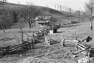 VIRGINIA, 1940. Rail fence and farm home near Luray, Virginia VIRGINIA, 1940. Rail fence and farm home near Luray, Virginia