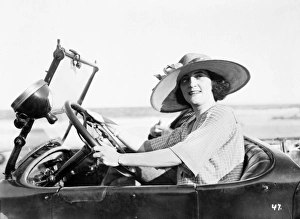 WOMAN DRIVING, c1921. A woman driving a car, c1921 WOMAN DRIVING, c1921. A woman driving a car, c1921