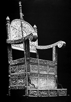 Wood-framed throne covered with carved ivory plates depicting scenes from mythology, heraldry Wood-framed throne covered with carved ivory plates depicting scenes from mythology, heraldry