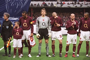 The Arsenal players line up before the mtch The Arsenal players line up before the mtch