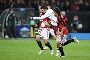 Cesc Fabregas shoots past Gennaro Gattuso and Andrea Pirlo to score the 1st Arsenal goal Cesc Fabregas shoots past Gennaro Gattuso and Andrea Pirlo to score the 1st Arsenal goal