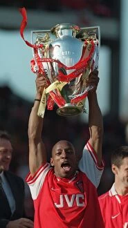 Images Dated 8th April 2005: Ian Wright (Arsenal) lifts the Premiership Trophy. Arsenal v Everton