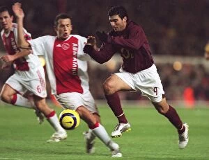 Images Dated 12th December 2005: Jose Reyes (Arsenal) Johnny Heitinga (Ajax). Arsenal 0: 0 Ajax