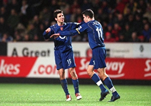 Robin van Persie is congratulated on scoring Arsenals 3rd goal by Cesc Fabrgeas Robin van Persie is congratulated on scoring Arsenals 3rd goal by Cesc Fabrgeas