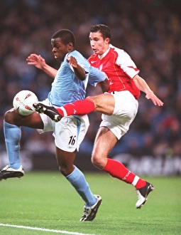 Rodin van Persie (Arsenal) Nedum Onuoha (Man City). Manchester City v Arsenal Rodin van Persie (Arsenal) Nedum Onuoha (Man City). Manchester City v Arsenal