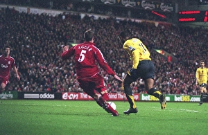 Thierry Henry breaks past Liverpool defender Daniel Agger to score the 3rd Arsenal goal Thierry Henry breaks past Liverpool defender Daniel Agger to score the 3rd Arsenal goal