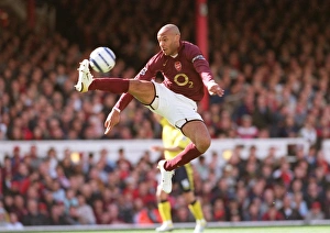 Thierry Henry brings the ball down on his way to scoring his 1st, Arsenals 2nd goal Thierry Henry brings the ball down on his way to scoring his 1st, Arsenals 2nd goal