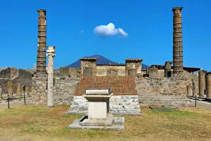 Ruined pillar in the ancient Roman city of Pompeii, Italy