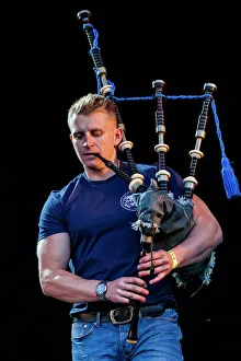Martin Gillespie of Skerryvore playing at Oban Live in Scotland Martin Gillespie of Skerryvore playing at Oban Live in Scotland