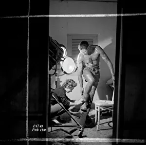 Anthony Quayle on the set of Ice Cold In Alex (1958) Anthony Quayle on the set of Ice Cold In Alex (1958)