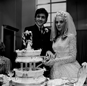 Jim and Jeanette cut the wedding cake Jim and Jeanette cut the wedding cake