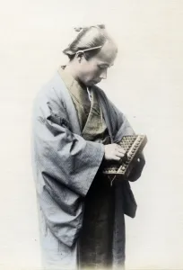 Japanese Man with Abacus Calculation