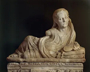 Alabaster urn featuring Haruspex priest holding up sheeps liver from Volterra, Pisa Province, Italy Alabaster urn featuring Haruspex priest holding up sheeps liver from Volterra, Pisa Province, Italy