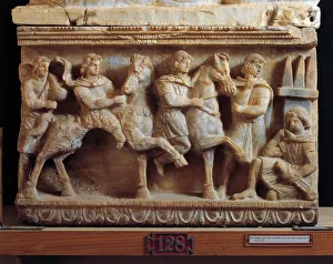 Alabaster urn with relief depicting the trip to hell on horseback, Etruscan civilization Alabaster urn with relief depicting the trip to hell on horseback, Etruscan civilization