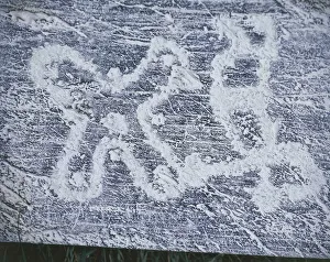 Camunian rose, copy of rock engravings in Valcamonica Valley, charcoal drawing, frottage technique Camunian rose, copy of rock engravings in Valcamonica Valley, charcoal drawing, frottage technique