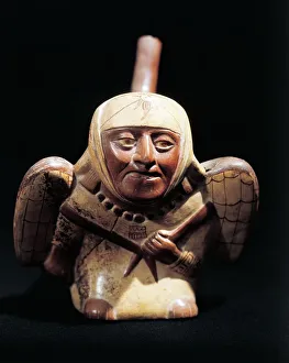 Ceramic artifact portraying mythological figure of birdman Ceramic artifact portraying mythological figure of birdman