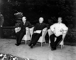 Clement Attlee, Harry Truman, and Joseph Stalin, seated outdoors at the Potsdam Clement Attlee, Harry Truman, and Joseph Stalin, seated outdoors at the Potsdam