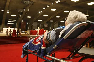 Disabled woman in the Lourdes basilica Disabled woman in the Lourdes basilica