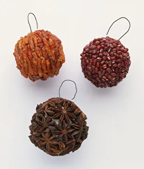 Three homemade baubles made of spices