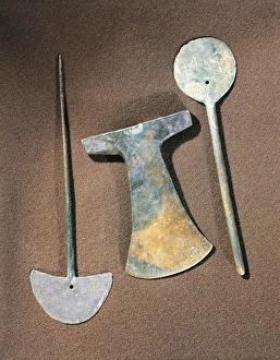 Iron axe and large pins, Bolivia, Tiwanaku culture Iron axe and large pins, Bolivia, Tiwanaku culture