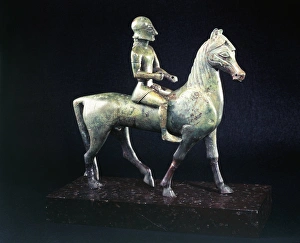 Italy, Basilicata, Grumento Nova, Statuette representing a knight, bronze Italy, Basilicata, Grumento Nova, Statuette representing a knight, bronze