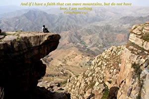 Man sitting on a rock in Halmlam, Halmlam, Yemen Man sitting on a rock in Halmlam, Halmlam, Yemen