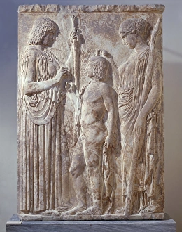 Marble bas-relief depicting Triad of Eleusinian Mysteries with Persephone, Demeter and Triptolemus, from Eleusis Marble bas-relief depicting Triad of Eleusinian Mysteries with Persephone, Demeter and Triptolemus, from Eleusis