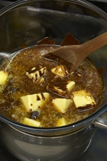 Melting chocolate and butter slowly in a bain marie Melting chocolate and butter slowly in a bain marie
