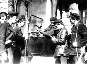 A naval patrol checking documents on the streets of petrograd ( st, petersburg ) in october of 1917 A naval patrol checking documents on the streets of petrograd ( st, petersburg ) in october of 1917
