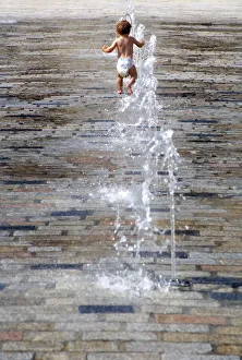 Playtime in the fountains of the Georgian Quadrangle of Somerset House, London 3 Playtime in the fountains of the Georgian Quadrangle of Somerset House, London 3