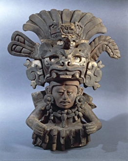 Polychrome ceramic funerary urn representing the god of corn, Zapotec civilization, Mexico Polychrome ceramic funerary urn representing the god of corn, Zapotec civilization, Mexico