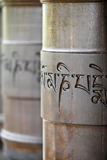 Prayer wheels in Dhagpo Kagyu Ling Tibetan buddhist monastery Prayer wheels in Dhagpo Kagyu Ling Tibetan buddhist monastery