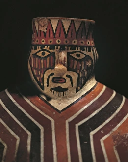 Detail of pre-Inca vessel in shape of man wearing striped poncho, 200-700 Detail of pre-Inca vessel in shape of man wearing striped poncho, 200-700