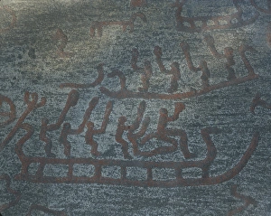 Prehistory, Bronze Age. Rock carvings in Kalnes, Norway. Detail with men on sledges Prehistory, Bronze Age. Rock carvings in Kalnes, Norway. Detail with men on sledges