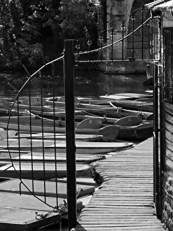 Punts moored by Magdalen Bridge on a fine, Autumn day Punts moored by Magdalen Bridge on a fine, Autumn day
