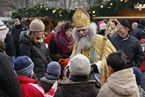 Saint Nicholas impersonator at Munich christmas market Saint Nicholas impersonator at Munich christmas market
