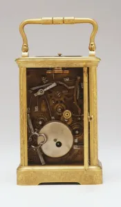 Studio Shot Of A Clock Prints: Rear view of clock, back open