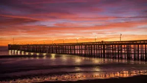 sunset over Ventura Pier on Pacific Ocean sunset over Ventura Pier on Pacific Ocean