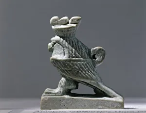 Tunisia, Carthage, Amulet representing Horus, the Falcon God, wearing a crown, siliceous paste Tunisia, Carthage, Amulet representing Horus, the Falcon God, wearing a crown, siliceous paste
