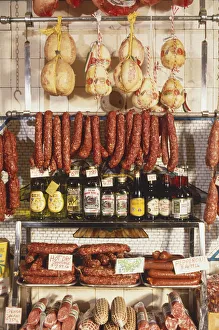 USA, New York, Manhattan, Little Italy, selection of smoked meats, sausages and olive oils in Italian delicatessen USA, New York, Manhattan, Little Italy, selection of smoked meats, sausages and olive oils in Italian delicatessen