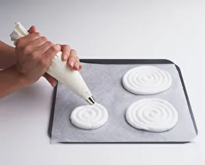 Using Nylon Piping Bag to shape Meringue Discs on Baking Tray