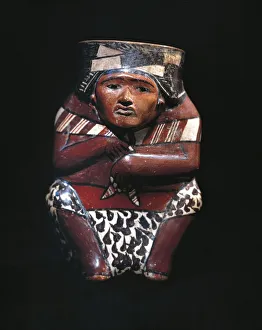 Vase depicting a hunter with an animal skin shawl, Nazca culture, Pre-Inca civilization, Peru Vase depicting a hunter with an animal skin shawl, Nazca culture, Pre-Inca civilization, Peru