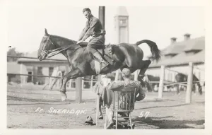 Prints of Photo of a soldier on horseback jumping over a table as two men sit at either side Vintage Postcard Prints: Fort Sheridan Photo Print of Soldier on Horseback Jumping Over Table