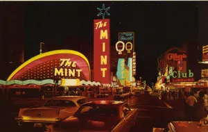 Prints of Vintage postcard showing a view down Fremont Street at night. The streets are lit up by the giant neon signs from the Mint and other clubs and hotels Vintage Postcard Prints: Fremont Street Nightlife Print