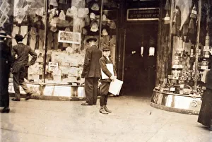 A young truant selling extras during school hours. Pennsylvania Avenue New York 1911 A young truant selling extras during school hours. Pennsylvania Avenue New York 1911