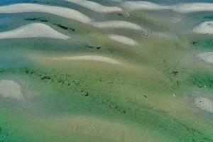 Aerial view of some sandbars forming as the tide goes out Aerial view of some sandbars forming as the tide goes out