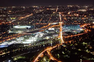 Aerial view of sports venues in Melbourne illuminated at night Aerial view of sports venues in Melbourne illuminated at night